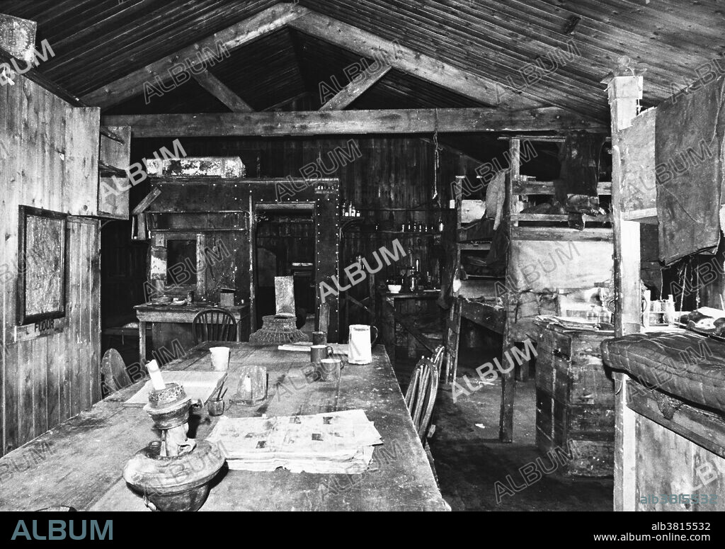 Interior of Shackleton's hut (centre) in the Antarctic. The hut was built at Cape Royds on Ross Island, during the British Antarctic (Nimrod) Expedition (1907-1909) led by Anglo-Irish explorer Ernest Shackleton (1874-1922). The whole of the expedition's shore party lived in this hut during the winter of 1908. Shackleton left in the spring and never returned. A letter was left inside, stating that there were sufficient provisions and equipment to last fifteen men for one year, indicating the details of these provisions. The letter ended with an invitation for any succeeding party to make what use they required of stores and hut. The hut was then locked and the key nailed on the door in a conspicuous place.