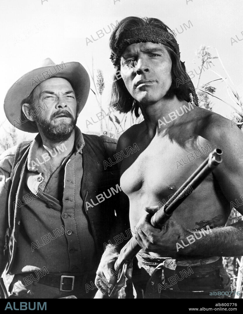 BURT LANCASTER and JOHN McINTIRE in APACHE, 1954, directed by ROBERT ALDRICH. Copyright UNITED ARTISTS/HECHT-HILL-LANCASTER.