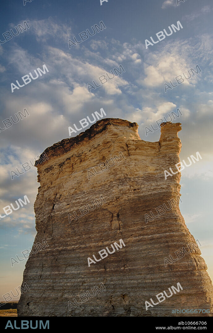 Monument Rocks National Natural Landmark near Oakley, Kansas. These chalk layers were deposited in the Western Interior Seaway over 80 million years ago. Wind and water then carved them into the shapes we see today.