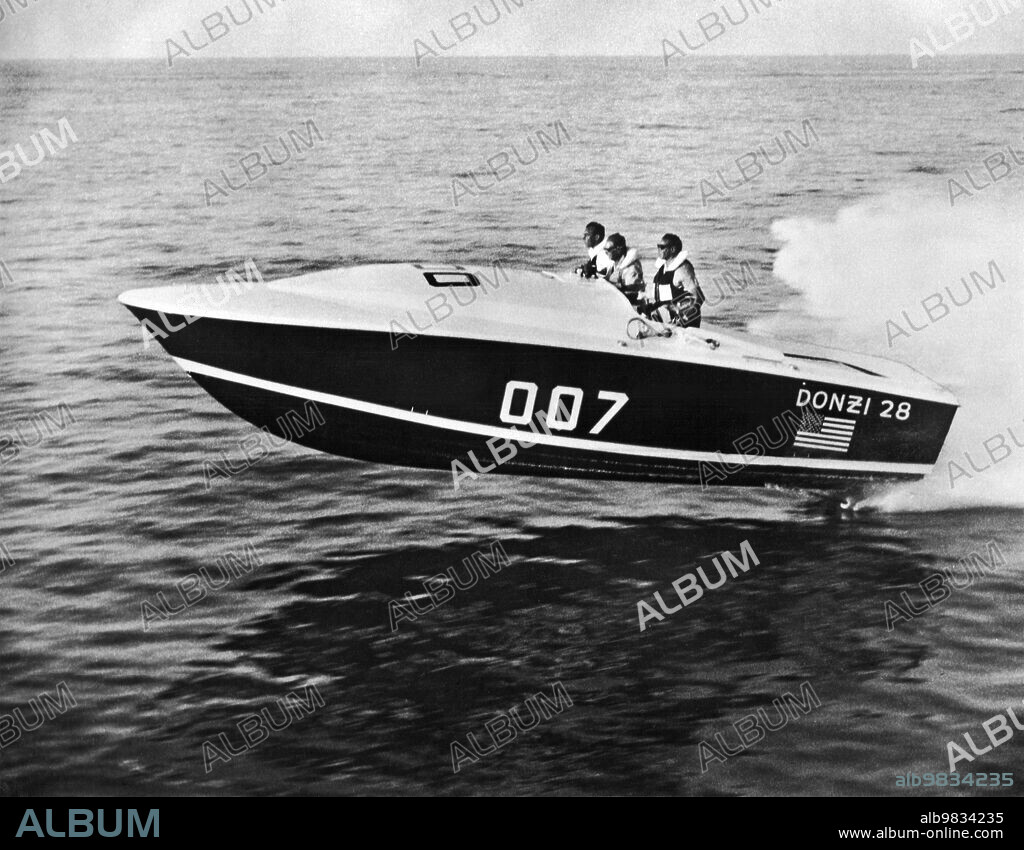 West Palm Beach, Florida April, 1965 Owner and builder Don Aronow of Miami pilots his 28 foot Donzi in which he won the 184 mile Miami-Nassau ocean race this year. It runs at 70 mph with twin 427 cubic-inch Holman-Moody Ford engines, each rated at 500 horsepower.