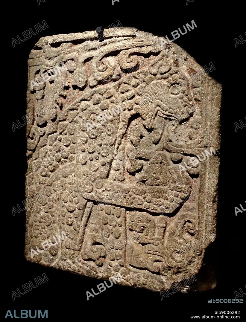 Mayan, calcified stone panel, with bas relief depicting a jaguar eating a heart. From the Great Palace at Chichen Itza, Yucatan, Mexico.