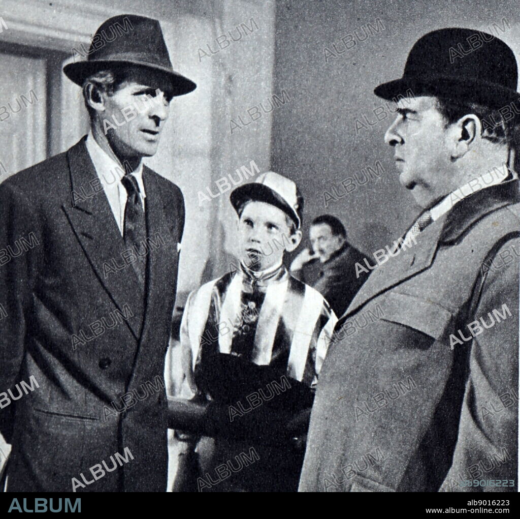 Film still from 'The Rainbow Jacket' starring Robert Morley, Fella Edmonds, Edward Underdown, Bill Owen, and Kay Walsh.