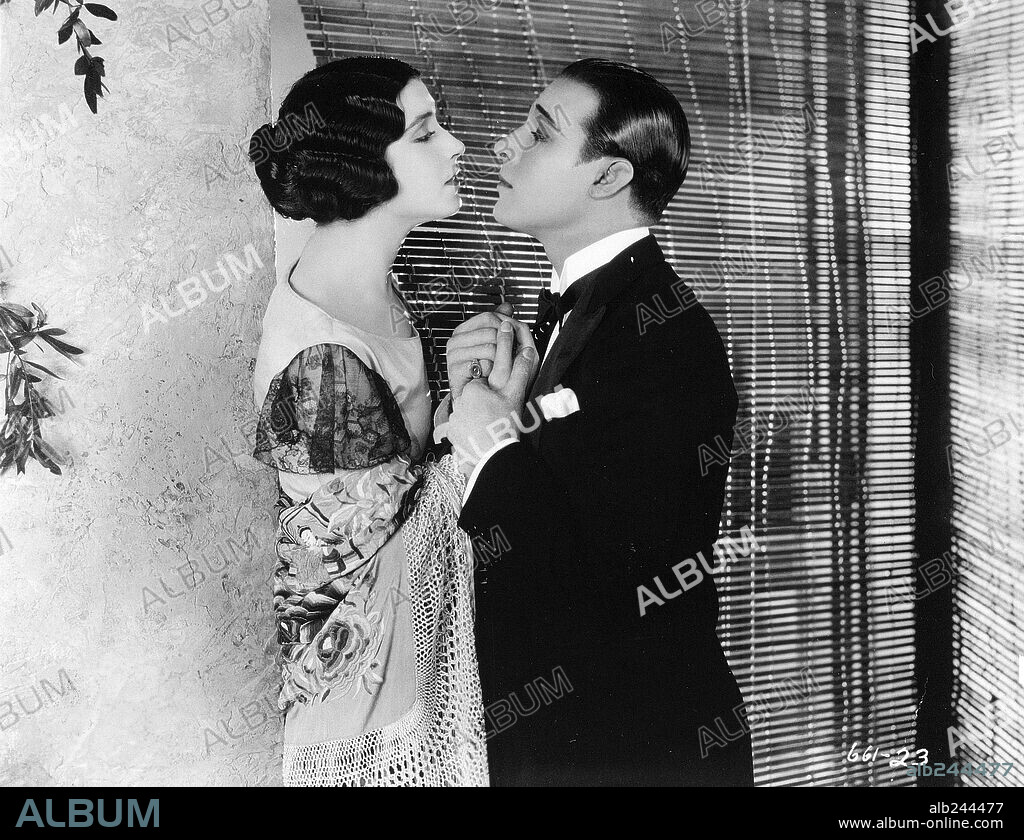 HELENE D'ALGY and RODOLFO VALENTINO. HELENE D'ALGY and RUDOLPH VALENTINO in A SAINTED DEVIL, 1924, directed by JOSEPH HENABERY. Copyright FAMOUS PLAYERS/PARAMOUNT.