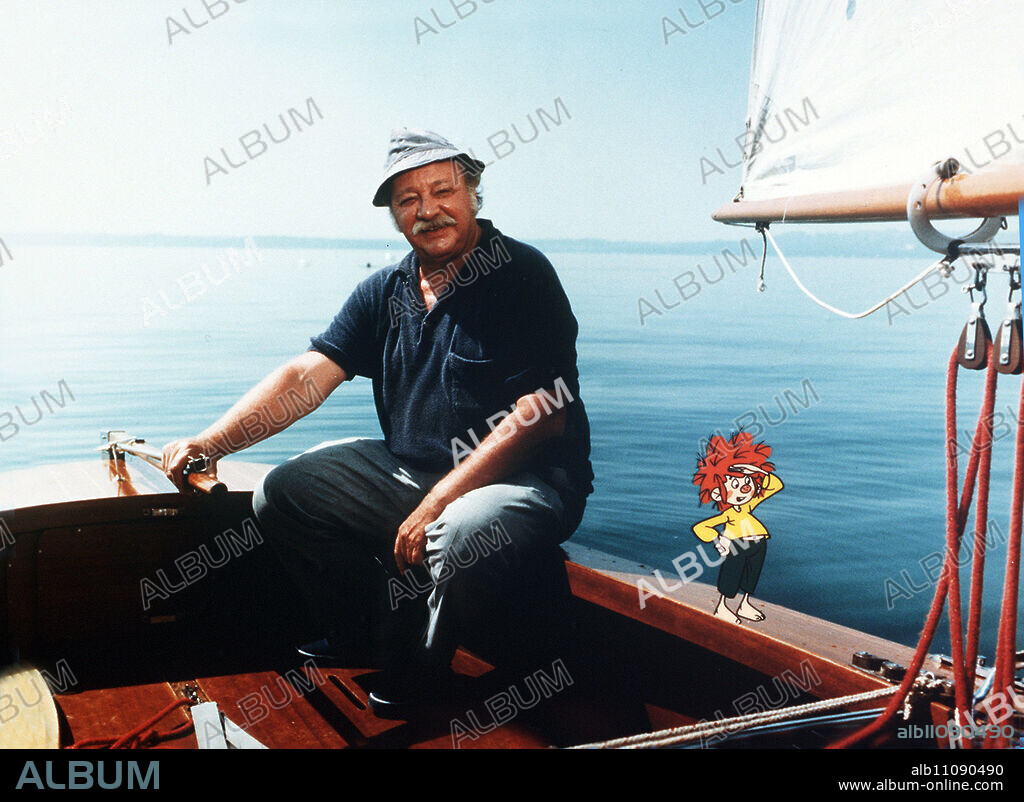 MASTER EDER AND HIS PUMUCKL / The Sailing Boat / Pumuckl and Master Eder (GUSTL BAYRHAMMER) go fishing. Both have a lot of fun. Then Master Eder wants to take a break, ties up the boat and goes to a cafe. Pumuckl doesn't like the knot that the boat is tied with. He playfully plays with it and it drifts out onto the lake... / Headline: MASTER EDER AND HIS PUMUCKL / D 1988.