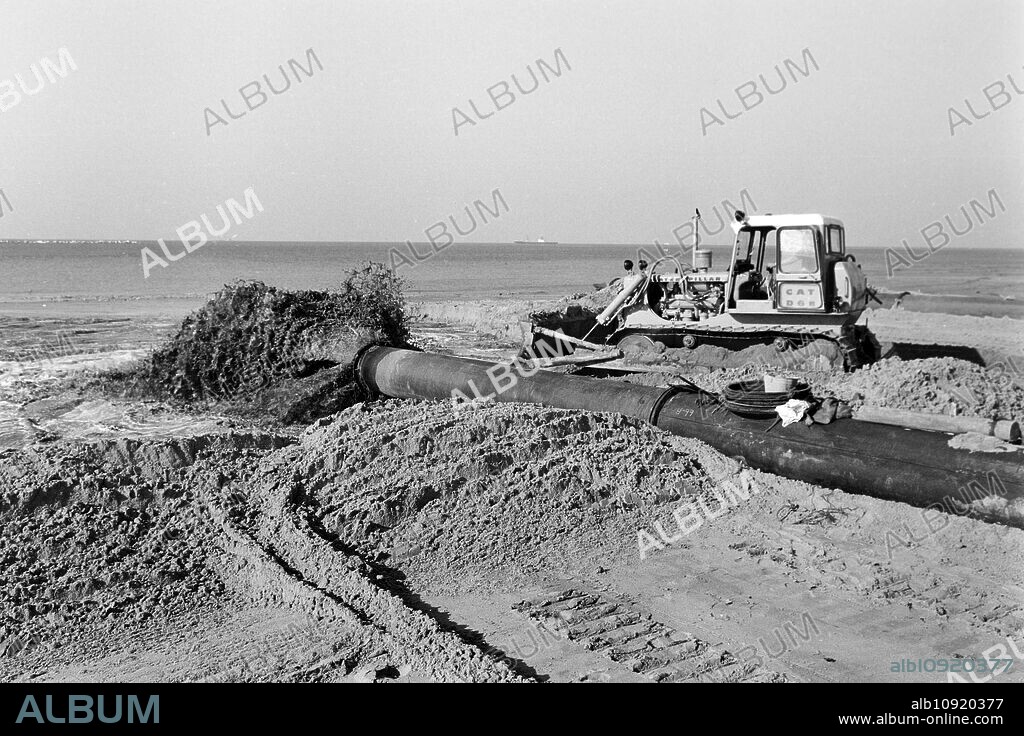 Land reclamation by earth deposit at the Rotterdam coastal region, The Netherlands 1971.