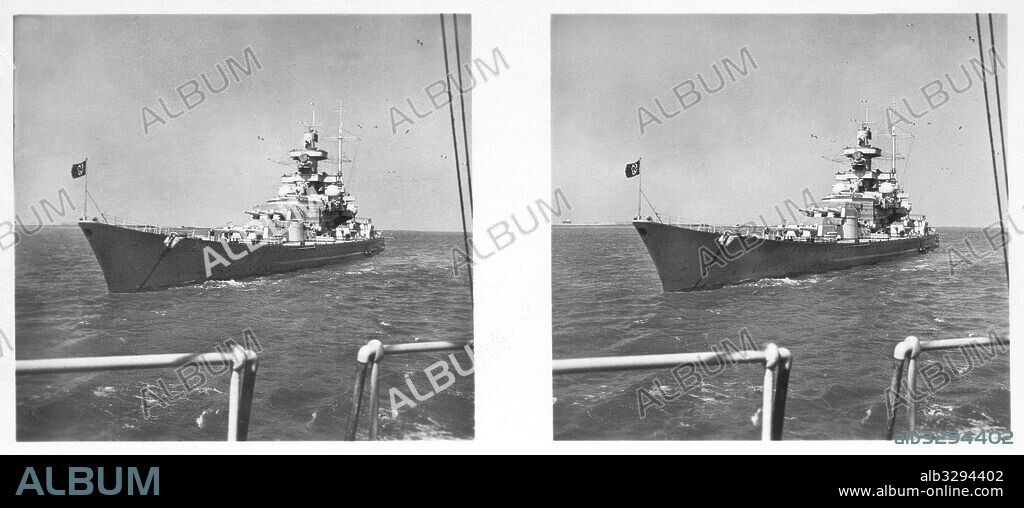 Battleships – A 26,000 ton battleship at anchor in the roads. Scharnhorst and Gneisenau are ships of this class.