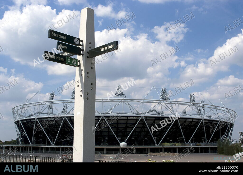 Signpost for the Greenway, with the OIympic Stadium behind, Stratford, London, England, United Kingdom, Europe.