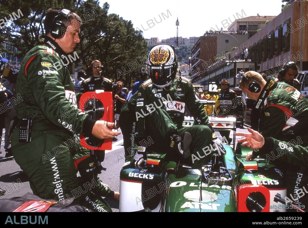 Eddie Irvine getting into No18 Jaguar-Cosworth, finished 3rd, Monaco Grand Prix, 27th May 2001.