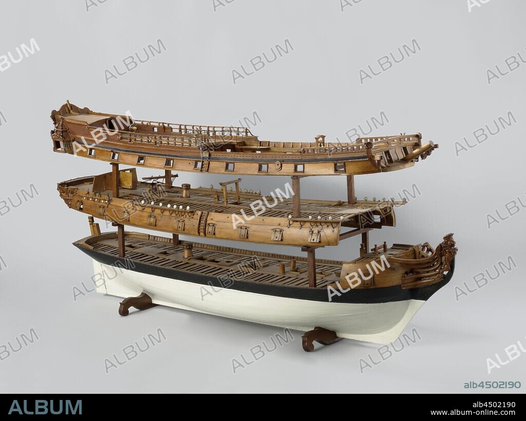 Model of a 40-gun warship Model of a 40-Gun Ship, Polychromed, fully detailed construction model to be taken apart in three layers, with solid wood under dense smooth-edged skin. Forty-eight gun ports spread over three decks. Decks on five levels: small cow bridge at the back, lower deck, intermediate deck and louse plaster, baking deck and half deck, upper campaneau, all indicated by their web, the rear parts of the top three decks covered. The elaborate galleon has a crowned lion as a figurehead, no apostles, the bowsprit rests on the prow. Wrong mirror, hollow wulf with wulfwood on the outside and two gates, two-storey fence with rolling work, garlands and an empty cartouche, side galleries of a floor with bell-shaped cover, straight rudder with square rudder king, lazy car under the intermediate deck, steering wheel on the half deck. Galley in the hold, a single spindle on the lower deck and one on the intermediate deck, an impact pump with pump tray and discharge pipes on the intermediate deck and the ship's bell on the starboard port deck. The model is equipped with all the rest with damsel blocks. The sheer runs up to both ends, the model has two barwoods and a deer. Peaked trusses. Remarkable are the replacement of the seed wood by two additional seed wood, the deviating betting construction, the pissbox and capstans. Under the lead white of the underwater ship, water lines with pencil have been applied, Rotterdam, Admiralty on the Maze, anonymous, 1738, wood (plant material), brass (alloy), bone (material), h 37.9 cm × l 127.5 cm × w 31 cm.