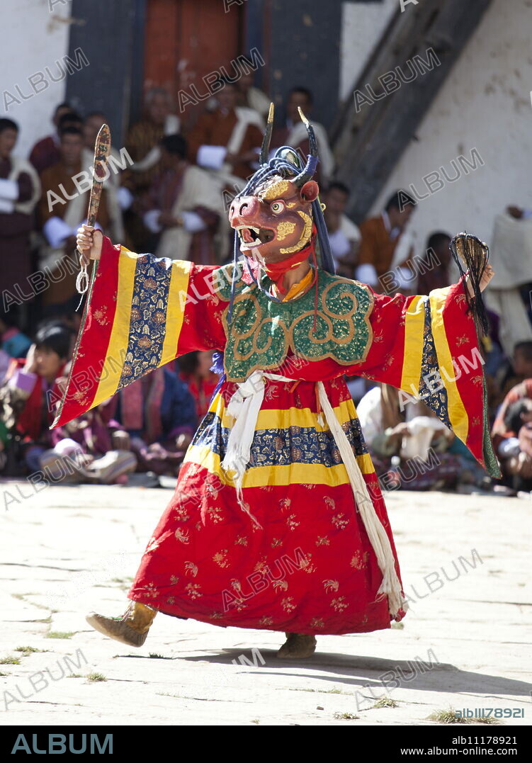 Buddhist monks performing masked dance during the Gangtey Tsechu at Gangte Goemba, Gangte, Phobjikha Valley, Bhutan, Asia.