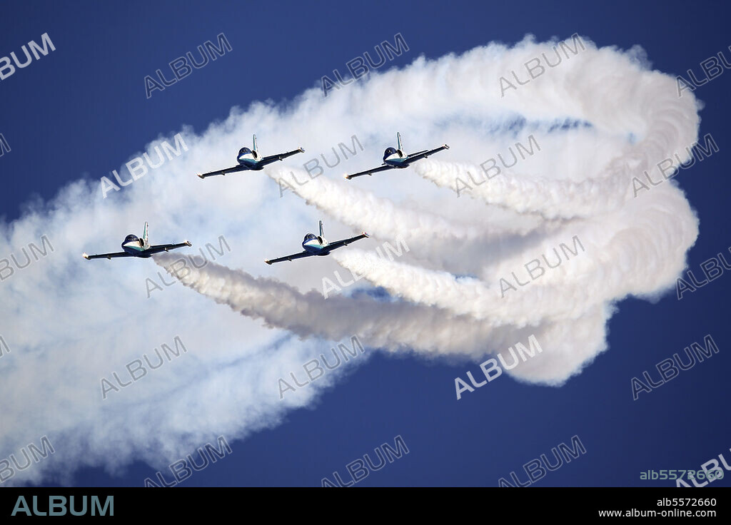 Group of L-39 Albatros training aircraft of the Russian aerobatics team during MAKS-2011 airshow, Moscow, Russia.