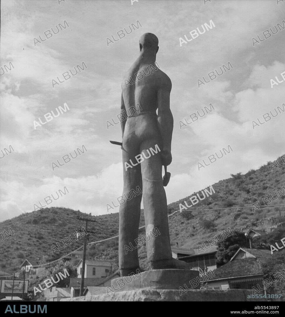 DOROTHEA LANGE. Monument dedicated to the copper miners of Arizona. Work of a local sculptor sponsored by Work Projects Administration. Bisbee, Arizona.