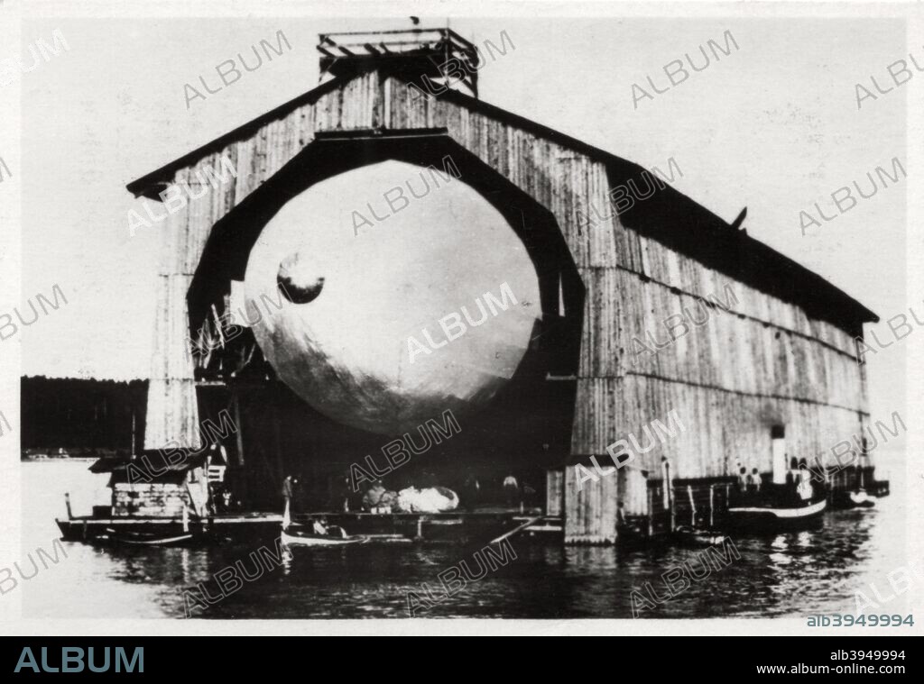 Zeppelin LZ1 in a floating hanger at Manzell, Friedrichshafen, Germany, 1900, (1933). The first Zeppelin, LZ1 was built and housed in this floating hangar on Lake Constance. It was designed to facilitate the launching of the airship as it could be aligned with the wind. A photograph from Zeppelin-Weltfahrten, Vom ersten Luftschiff 1899 bis zu den Fahrten des LZ127 Graf Zepplin 1932, Dresden, 1933.