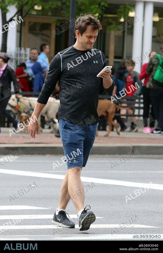 May 10, 2018 - New York, New York, United States - Actor Hugh Dancy seems utterly engrossed in his cellphone as he walks in Soho on May 10 2018 in New York City. 10/05/2018