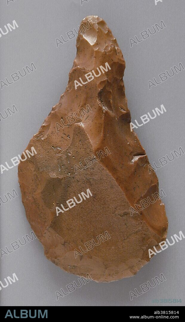 Egyptian flint, Neolithic Period (5500 - 3100 BC). A hand axe or biface is a prehistorical stone tool with two faces, and the longest-used tool in human history. Its technical name (biface) comes from the fact that the archetypical model is a generally bifacial Lithic flake with an almond-shaped morphology. The most common hand axes have a pointed end and rounded base, which gives them their characteristic shape, and both faces have been knapped to remove the natural cortex, at least partially.