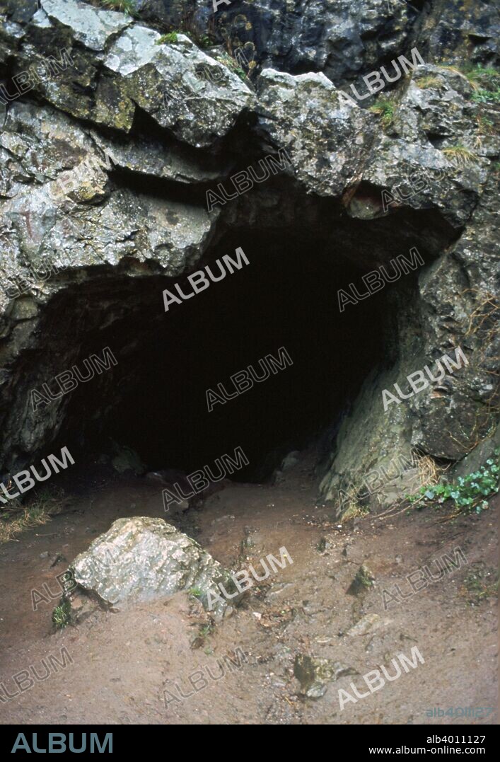 Aveline's hole, a paleolithic cave dwelling in the Mendip hills, Somerset, England. A view of the entrance from outside, 12000 BC.