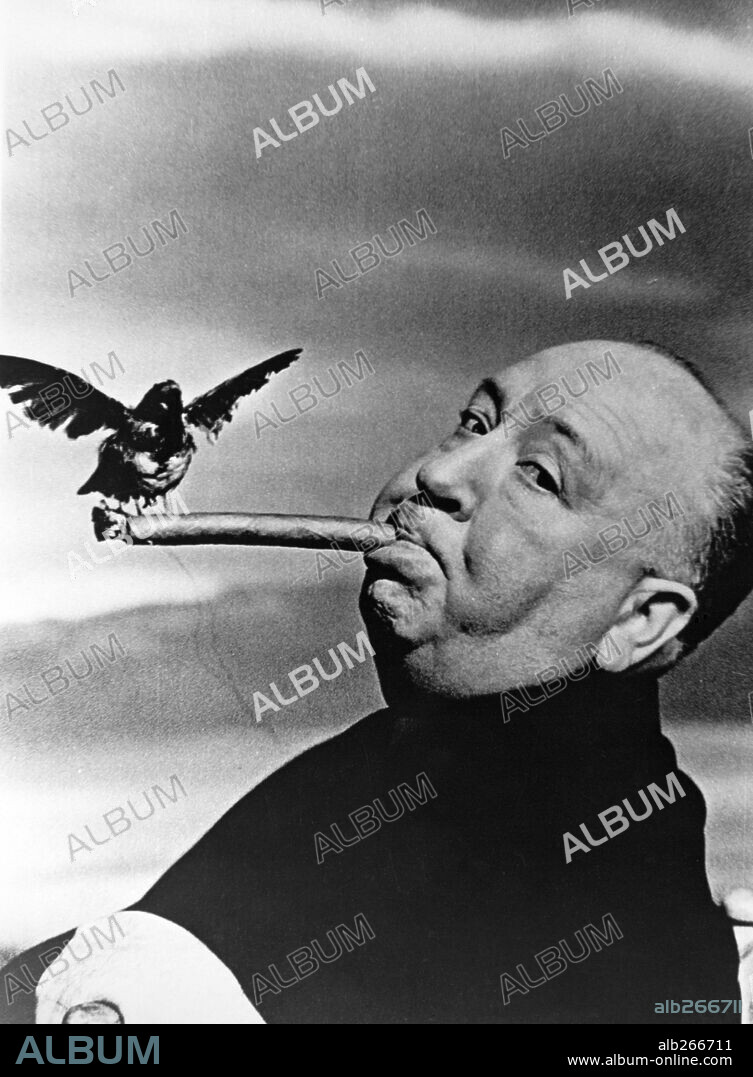 ALFRED HITCHCOCK in THE BIRDS, 1963, directed by ALFRED HITCHCOCK. Copyright Alfred J. Hitchcock Productions.