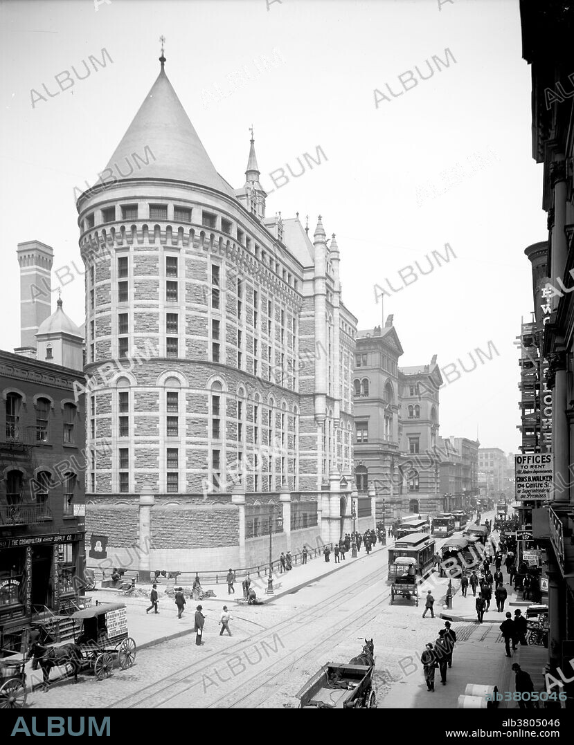 The Tombs is the colloquial name for the Manhattan Detention Complex a municipal jail in Lower Manhattan at 125 White Street, as well as the nickname for three previous city-run jails in the former Five Points neighborhood of lower Manhattan. The original Tombs, officially known as the Halls of Justice, was built in 1838 in the Egyptian Revival style. It was a replacement for the colonial era Bridewell Prison, located in today's City Hall Park. The new structure incorporated material from the Bridewell (built in 1735 and demolished in 1838), mainly granite, to save money. Photograph shows Tombs II, 1902-1941, City Prison. Photograph from 1904 Shows the Tombs, built in 1902, with Centre Street at right taken by A. Loeffler, Tompkinsville, NY.