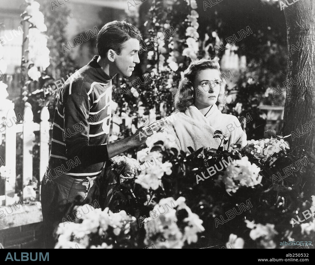 DONNA REED and JAMES STEWART in IT'S A WONDERFUL LIFE, 1946, directed by FRANK CAPRA. Copyright RKO.