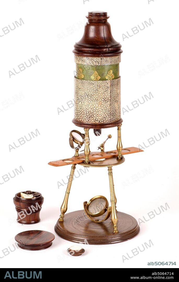 Scientific instrument, Culpepper Compound Microscope, with Case, 1725-30 The compound microscope was invented in the early seventeenth century. Until around 1740, all microscopes consisted of a thin wooden or cardboard cylinder, generally covered with shagreen (shark skin) or leather. Culpepper is one of the great names associated with early microscopes. This one has its own fitted oak case with a drawer to the bottom. There are also several boxwood specimen slides. Wood, Science and Industry, Social history, Health and Medicine.