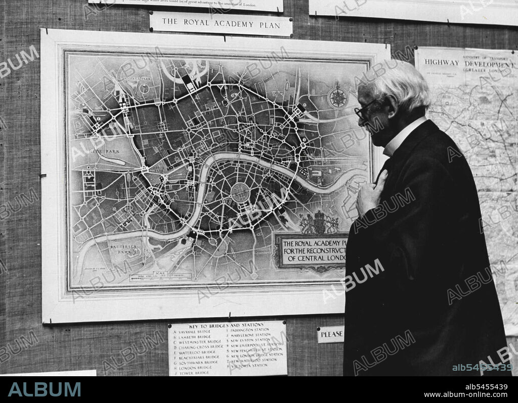 Plans For A New London -- Sir Edwin Lutyens looking at the Royal Academy map of the new Central London which many of Edwins ideas have been introduced.Royal Academy plans for a new London will be revealed at an exhibition to be opened at Burlington House, Piccadilly, next Thursday. This great scheme has grown out of the Greater London Highway Development Survey, better known as the Bressey Plan. It was prepared by Sir Charles ***** Bressey in consultation with Sir Edwin Lutyens, for the Ministry of Transport between 1934 and 1938. For the first three years a Royal Academy Committee of 15 architects has been working on revision of the plan. October 13, 1942. (Photo by Fox Photos).