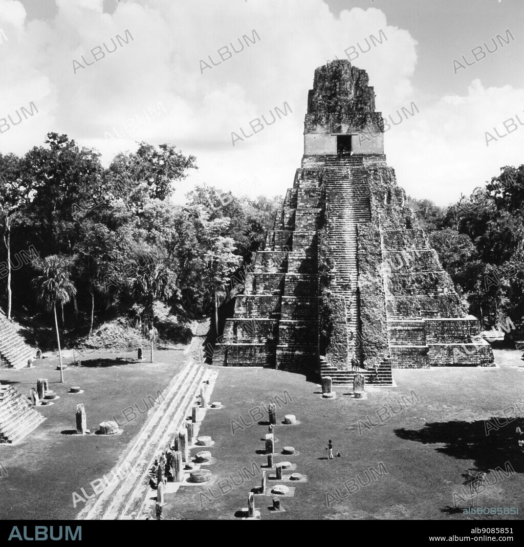 Temple II - Tikal - Guatemala. Tikal (or Tik'al, according to the more current orthography) is the largest of the ancient ruined cities of the Maya civilization. It is located in the El Petén department of Guatemala. Now part of Guatemala's Tikal National Park, it is a UNESCO World Heritage Site and a popular tourist spot. ©TopFoto.