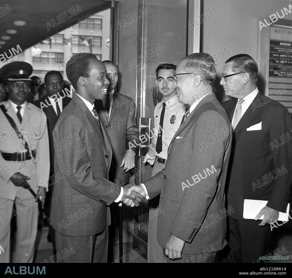PRESIDENT OF TANGANYIKA JULIUS NYERERE WITH UN SECRETARY GENERAL U THANT IN NEW YORK / ;. 19 JULY 1963.