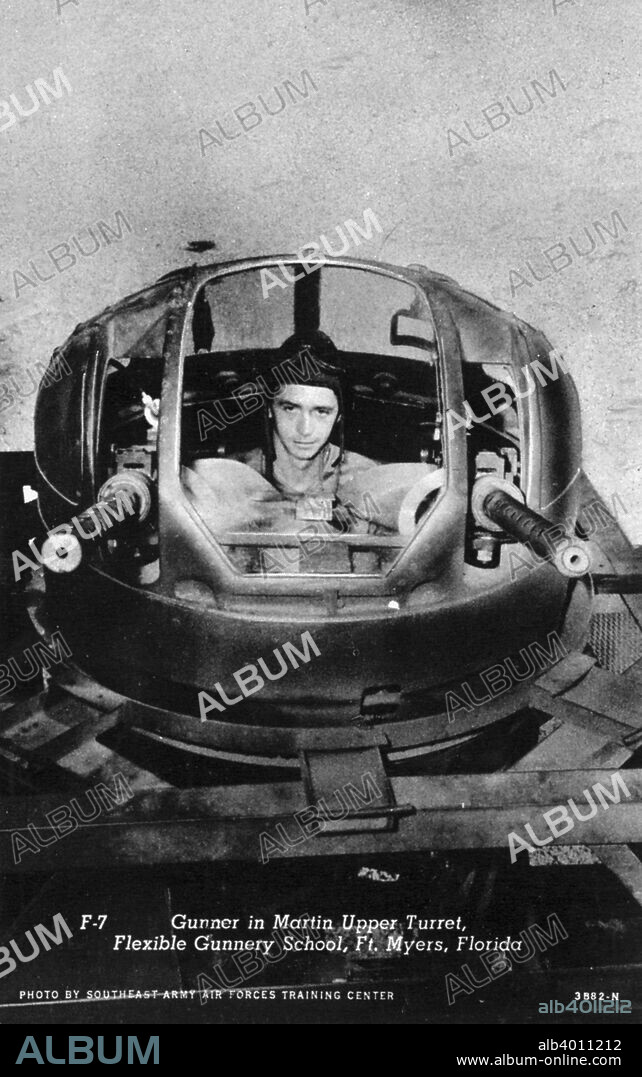 Gunner in a Martin upper turret, Flexible Gunnery School, Fort Myers, Florida, USA, 1943. Postcard. This type of turret was used in the Martin B-26 Marauder bomber.