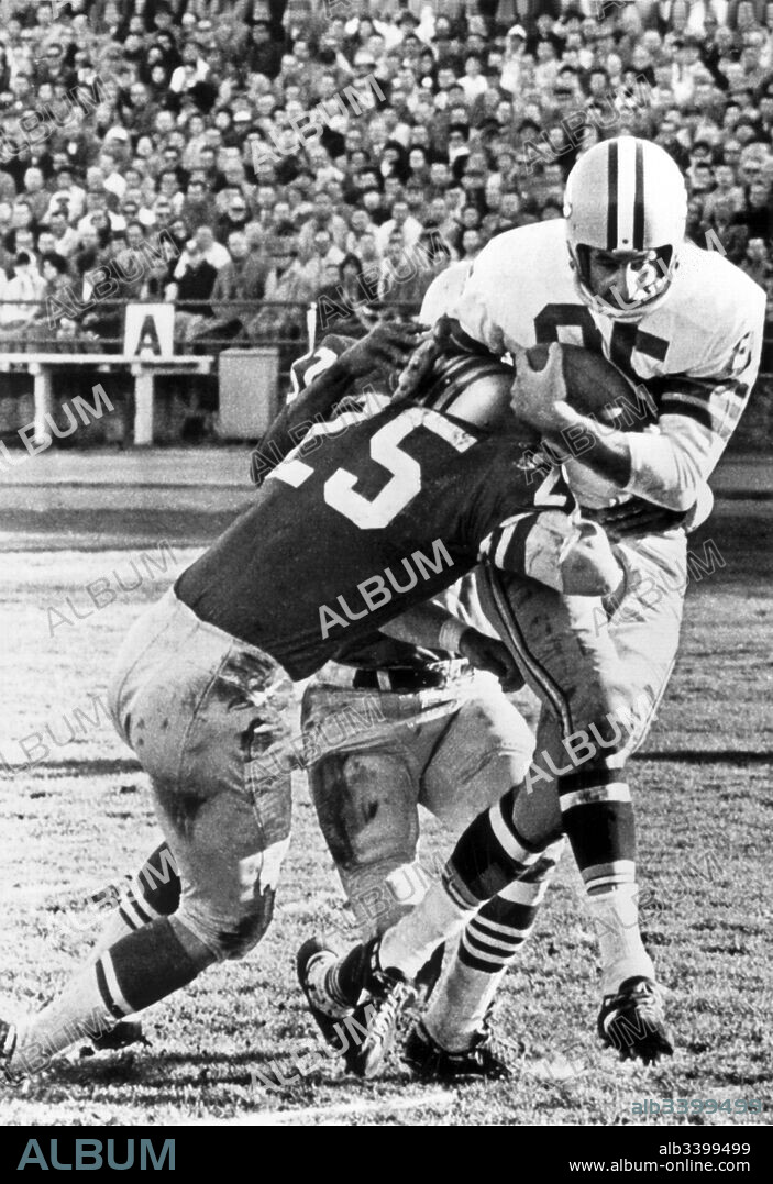 San Francisco, California:  December 10, 1961 Green Bay Packer receiver Max McGee (#85)just before he scored a touchdown and collided with the goal post at Kezar Stadium in San Francisco. He was knocked unconscious for three minutes and and was carried from the field and did not resume play.