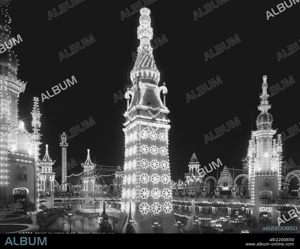All aglow with electric lights is Luna Park on Coney Island Amusement Park, New York.