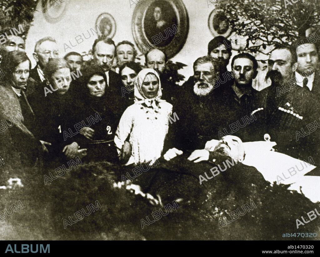 Vladimir Ilyich Lenin  (1870-1924). Russian revolutionary, author, lawyer, economic theorist, political philosopher, creator of the Soviet Communist Party, leader of the 1917 October Revolution, and founder of the USSR. Lenin's corpse before his wife Krupskia (number 1) and his sister Mary Illichna (number 2).