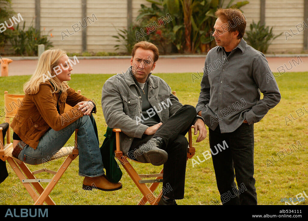 DIANE KRUGER, JERRY BRUCKHEIMER and NICOLAS CAGE in NATIONAL TREASURE, 2004, directed by JON TURTELTAUB. Copyright TOUCHSTONE PICTURES / ZUCKERMAN, ROBERT.