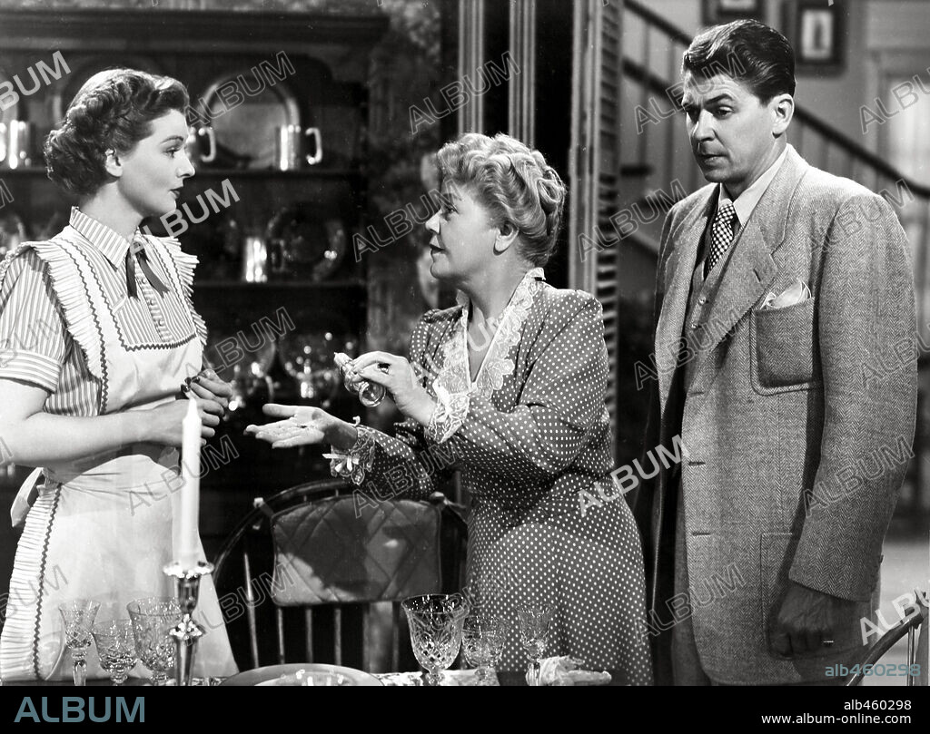 RONALD REAGAN, RUTH HUSSEY and SPRING BYINGTON in LOUISA, 1950, directed by ALEXANDER HALL. Copyright UNIVERSAL PICTURES.