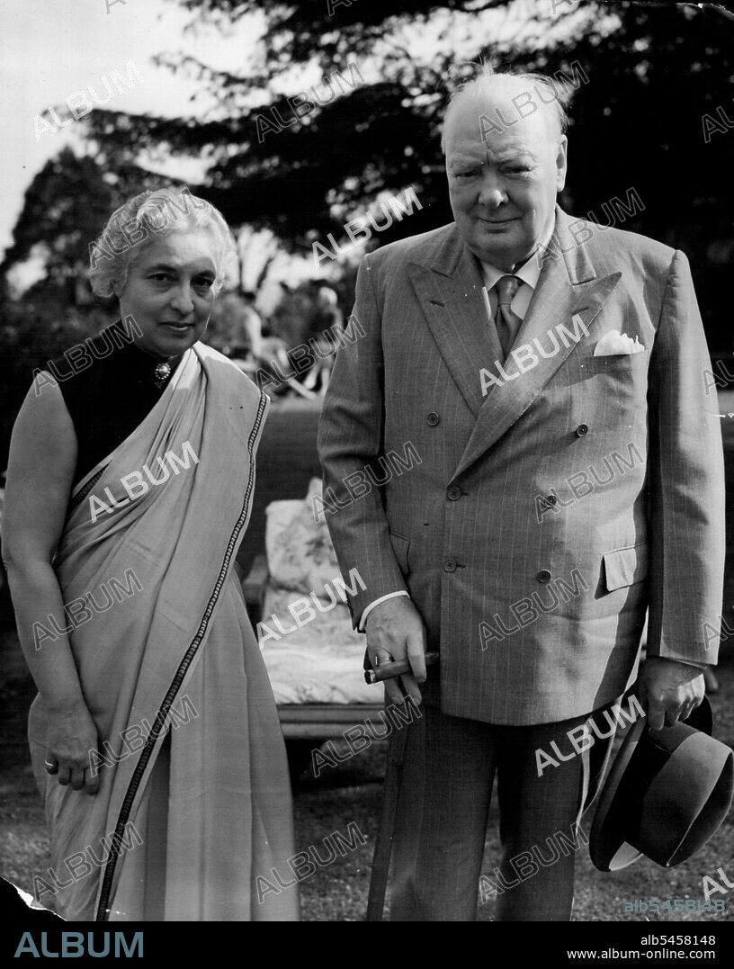 Mrs. Pandit at Chartwell: Tea with Sir Winston - Mrs. Pandit with Sir Winston Churchill at Chartwell to-day.Mrs. Vijaya Lakshmi Pandit, sister of Indian Premier Jawaharlal Nehru and President of the United Nations General Assembly, had tea with Sir Winston and Lady Churchill at their Chartwell (Kent) home to-day, Sunday. Mrs. Pandit arrived in London last Monday for a week's official Assembly. Her engagements have included an audience with the Queen. July 11, 1954. (Photo by Reuterphoto).