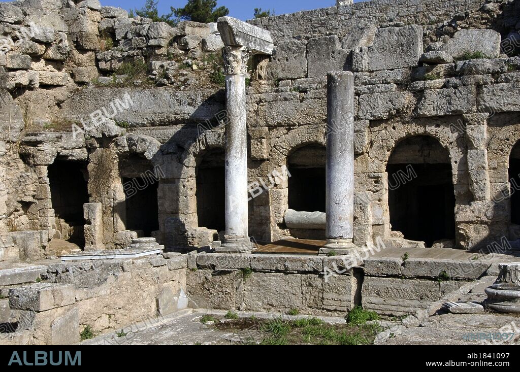 Greece. Ancient Corinth (polis). Fountain of Peirene or the Upper Pirene spring, located on Acrocorinth (Acropolis). The Greeks and Romans considered it a sacred location where the great Pegasus was tamed by a local hero. Remains of the Roman facade, 3rd century (Herodes Atticus's times) Peloponnese region.