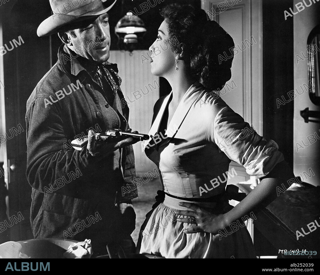 ANTHONY QUINN and KATY JURADO in MAN FROM DEL RIO, 1956, directed by HARRY HORNER. Copyright UNITED ARTISTS.