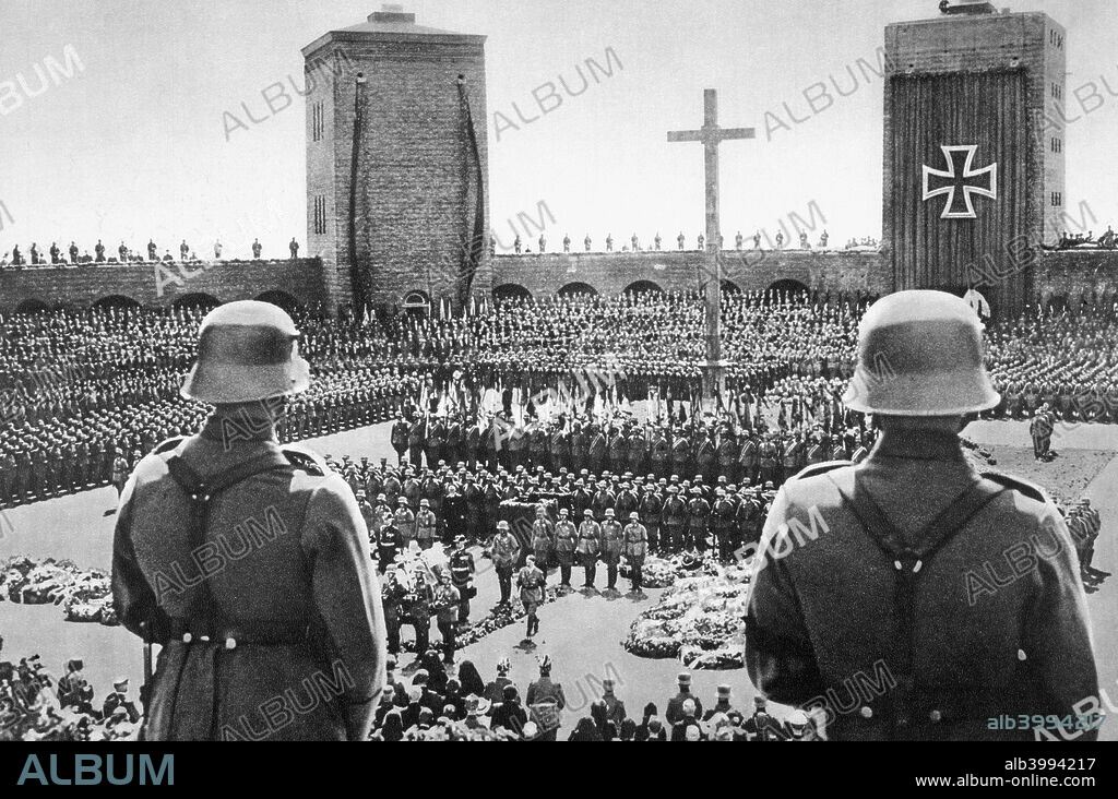 Nazi memorial ceremony for President von Hindenburg, Court of Honour, Tannenberg, 7th August 1934. Field Marshal Paul von Hindenburg (1847-1934) served as Germany's president from 1925 until his death. Tannenberg was the site of his great victory over the Russians in the early days of World War I. With Hindenburg dead, Hitler was able to assume absolute power as Fuehrer (leader) and Chancellor of Germany. From Deutsche Gedenkhalle: Das Neue Deutschland compiled by General Von Eisenhart Rothe, 1939.