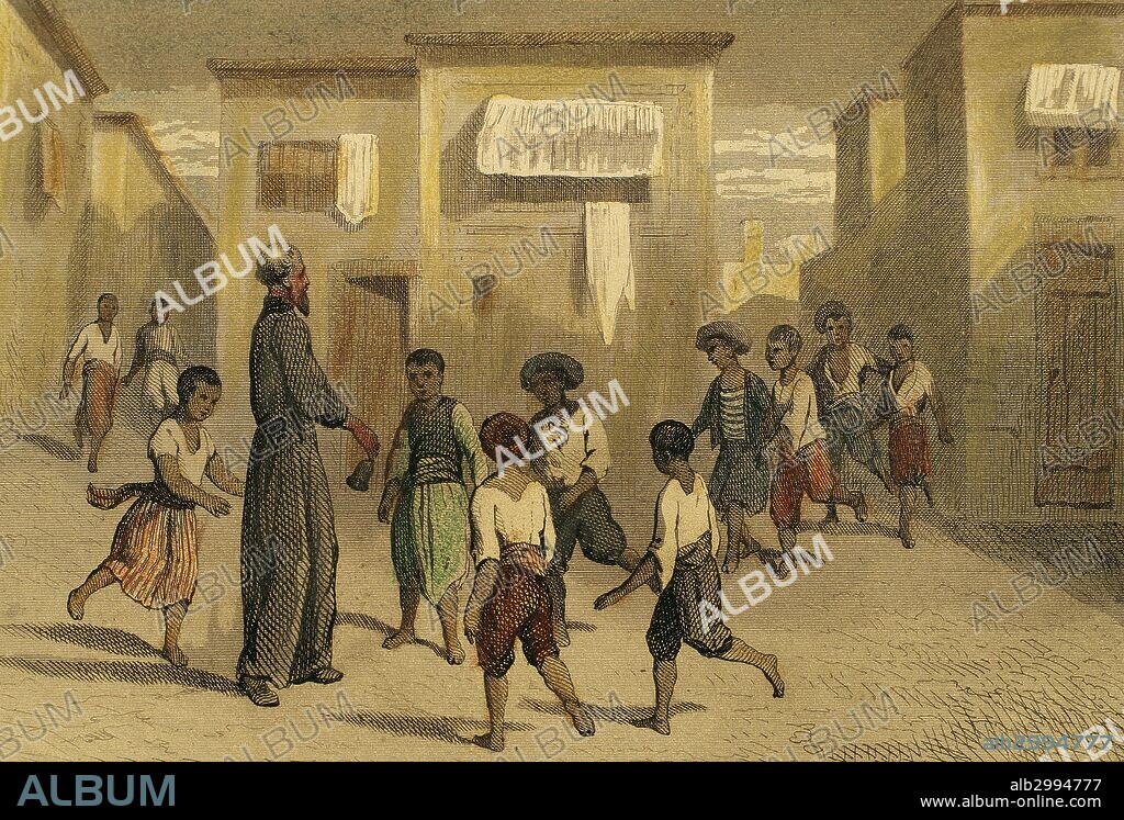 Saint Francis Xavier (1506-1552), Spanish missionary, through the streets of the Portuguese colony of Goa (India) in 1542. French engraving, 1850. Colored.