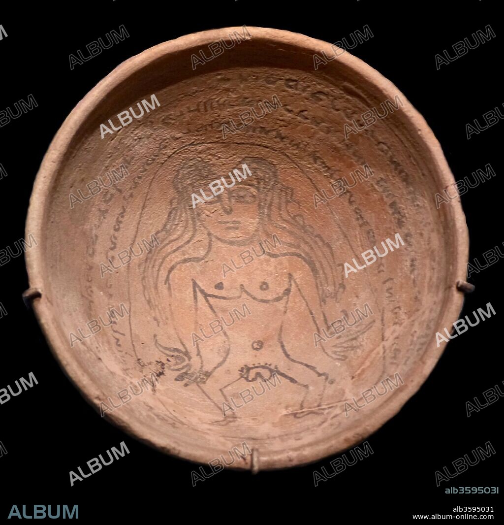 SASSANIAN ART. Magic bowl with an incantation text in Judeo-Aramaic and an image of the demon Lilith.