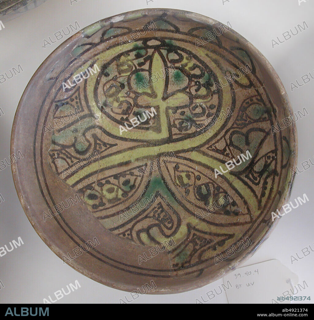 Bowl, late 10th century, Excavated in Iran, Nishapur, Earthenware; polychrome decoration under transparent glaze (buff ware), H. 2 13/16 in. (7.2 cm), Diam. 7 1/16 in. (18 cm), Base: 3 9/16 in. (9 cm), Ceramics.