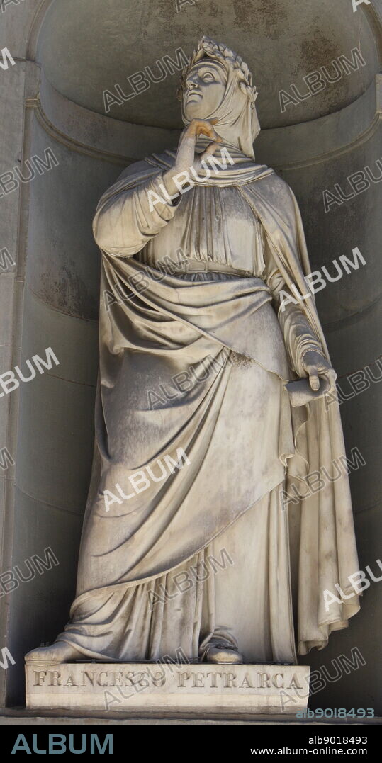 Statue located outside of the Uffizi museum in Florence, Italy. One of the oldest art museums in the Western World. Semi enclosed figurative statues such as this appear all over Florence. Statue of Francesco Petrarch, Italian scholar and poet, one of the earliest humanists.