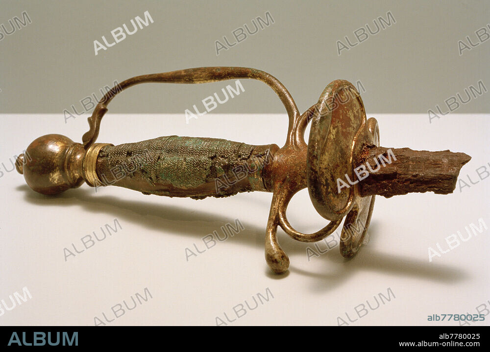Bernini, Gian Lorenzo; ital. Baumeister, Bildhauer u. Maler; Neapel. 7.12.1598 - Rom 28.11.1680. - Berninis Degen, um 1610 - 1620. - Stahl, vergoldetes Messing, Bronze, Holz, 20 × 9 cm. Vatikanstadt, Museo Storico della Patriarcale, Basilica di S. Maria Maggiore.