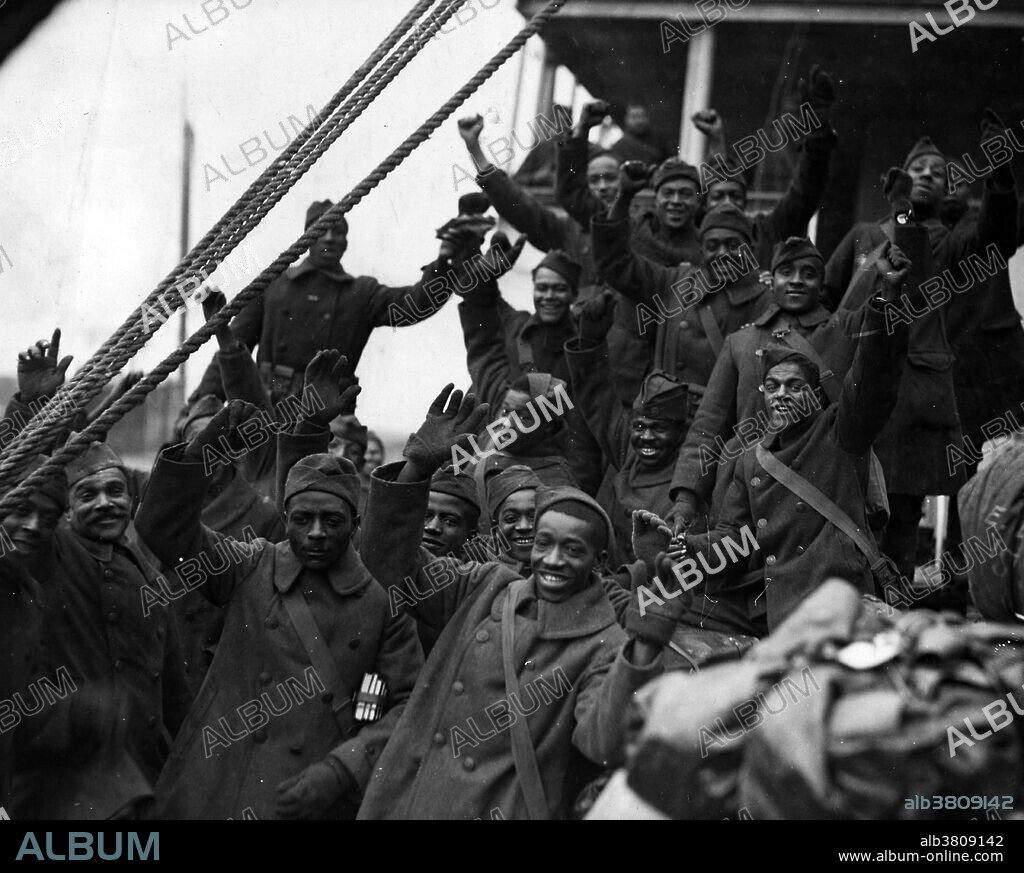 The 369th Infantry Regiment, formerly the 15th New York National Guard Regiment, was an infantry regiment of the United States Army that saw action in World War I and World War II. The 369th Infantry is known for being the first African-American and Puerto Rican regiment to serve with the American Expeditionary Force during World War I. The regiment was nicknamed the Harlem Hellfighters and the Black Rattlers. By the end of the war, 171 members of the 369th were awarded the Legion of Honor. At the end of the war, the 369th returned to New York City, and in February 1919, paraded through the city. Thousands lined the streets to see them: the parade began on Fifth Avenue at 61st Street, proceeded uptown past ranks of white bystanders, turned west on 110th Street, and then swung on to Lenox Avenue, and marched into Harlem, where black New Yorkers packed the sidewalks to see them. Despite the fact that they were decorated upon returning to New York the 369th Regiment were not allowed to participate in Victory Parade of 1919.
