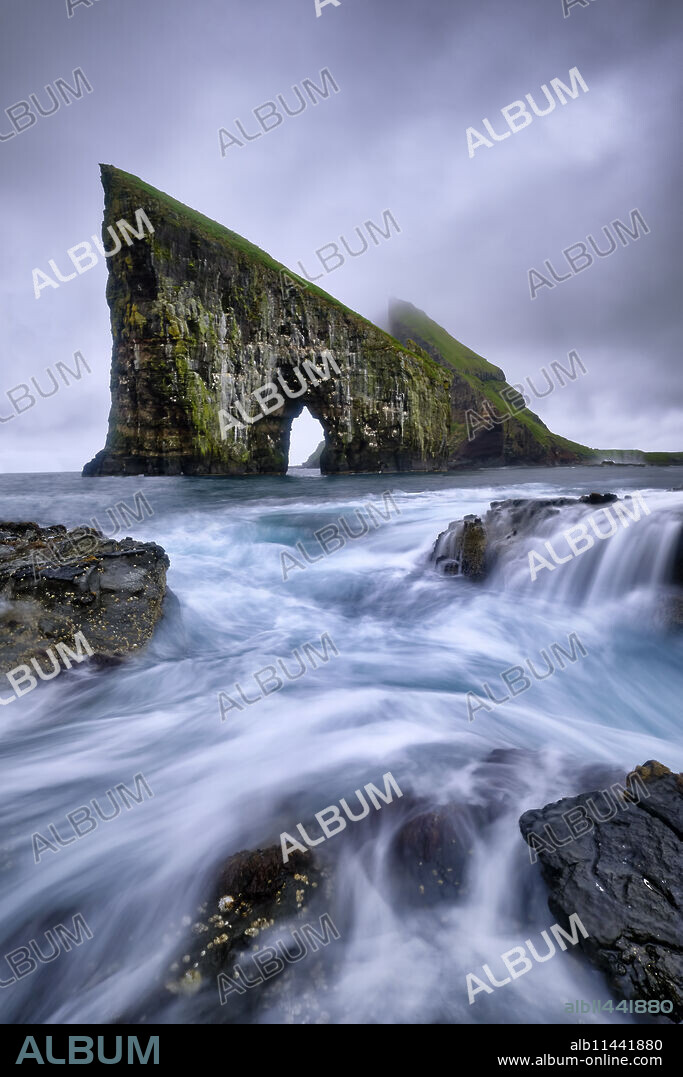 Drangarnir is the most famous natural arch of the whole Faroe Island, Faroe Islands, Denmark, Europe.