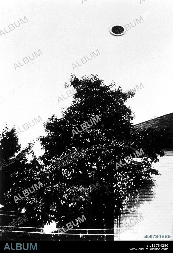 UFO photographed by George J. Stock at Passaic, New Jersey, USA, 29th July 1952 - one in series of five. - ©TopFoto / Fortean.