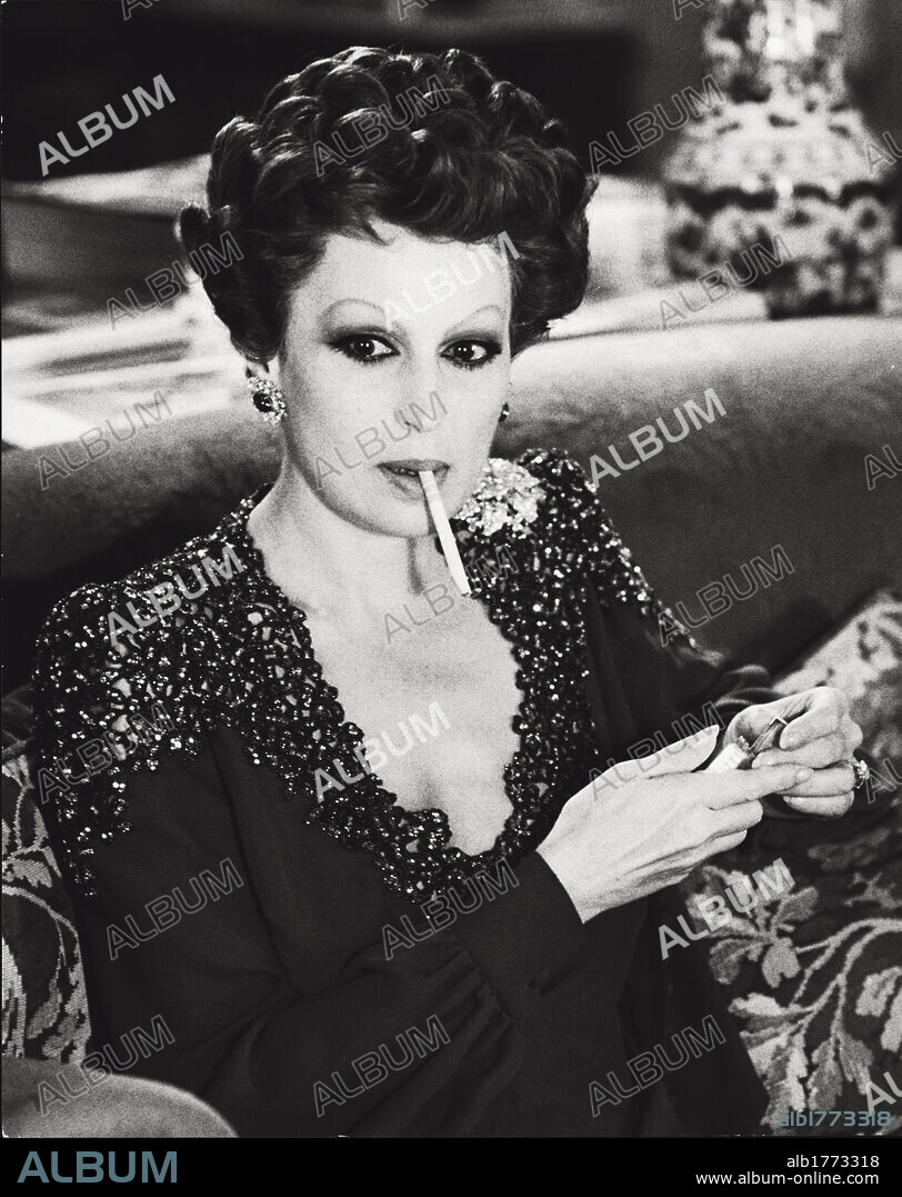 Silvana Mangano playing a scene of the movie. Italian actress Silvana Mangano playing the marchesa Bianca Brumonti on set of the film. Rome, 1970s.