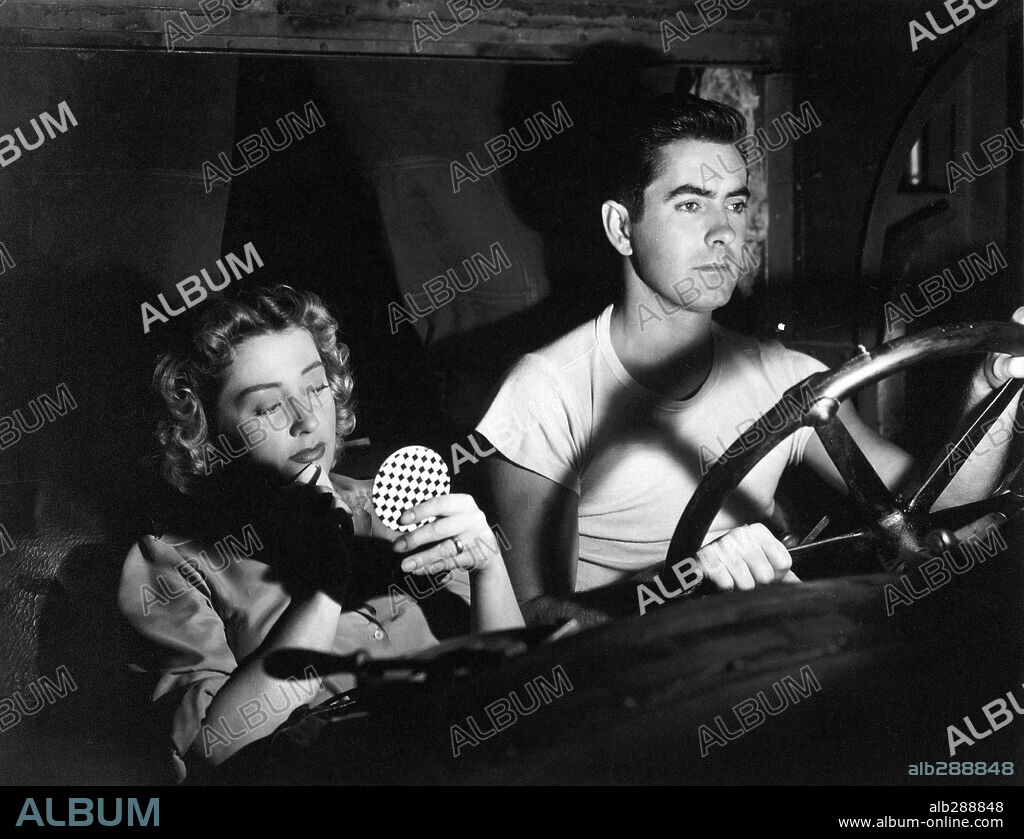 JOAN BLONDELL and TYRONE POWER in NIGHTMARE ALLEY, 1947, directed by EDMUND GOULDING. Copyright 20TH CENTURY FOX.