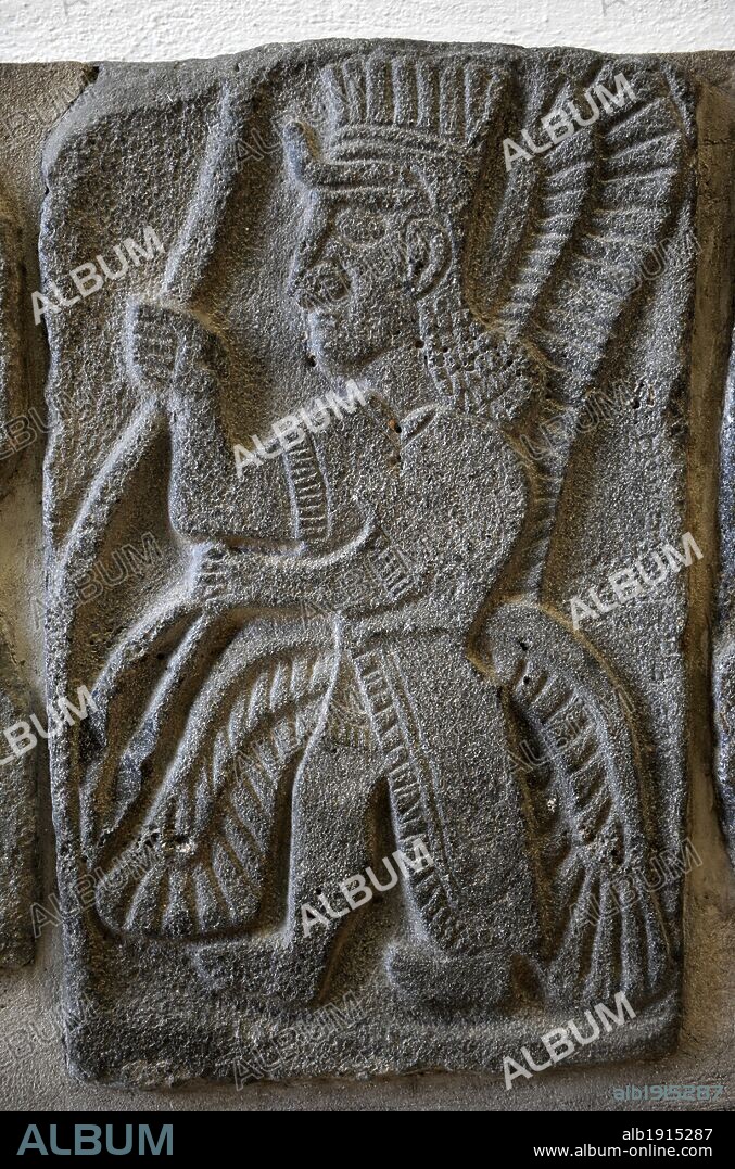 Mesopotamia. Halaf culture. (ca 6000-5300 BC). Neolithic. Syria. Orthostat. Winged god. Temple of Tell Hall. Basalt. 9th century BC. Pergamon Museum. Museum Island. Berlin. Germany.