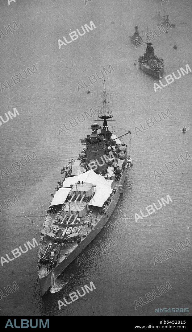 Ships Of The Home Fleet Arrive In The Thames -- An aerial view of the five battleships just off Southend, From front to back they are Nelson; Rodney; Royal Sovereign; Ramillies and Revenge.
Twenty eight ships of the Home Fleet arrived in the Thames today. They are being anchored at intervals from Southend to London Bridge and the public will be able to visit them until May 12th. May 07, 1937. (Photo by Keystone).