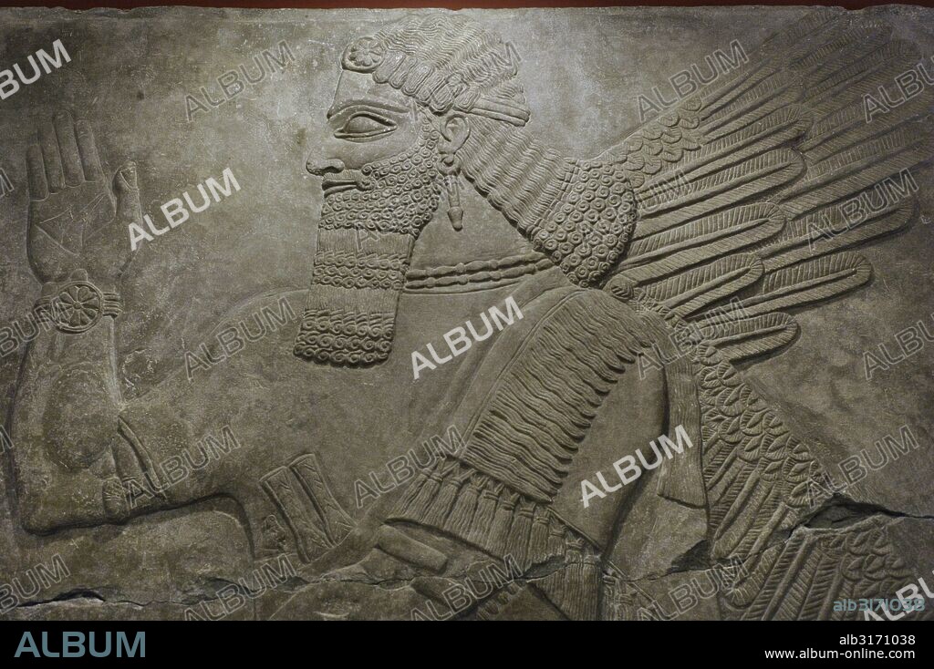 Assyria. Winged deity. Relief from the Palace of Ashurnasirpal II at Kalhu (Nimrud, Iraq). The state Hermitage Museum. Saint Petersburg. Russia.
